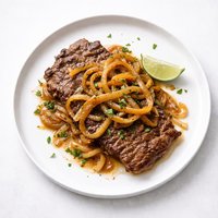 Bistec Encebollado Steak and Onions