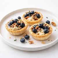 Blueberry Walnut and Brie Tartlets