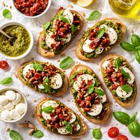 Bruschetta with Pesto Mozzarella and Sun Dried Tomatoes