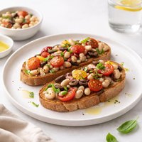 Bruschetta with White Beans Tomatoes and Olives
