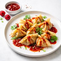 Chicken Wontons with Raspberry Szechuan Sauce