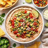 Creamy Bean Dip with Tomato Avocado Topping