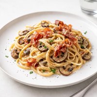 Creamy Garlic Pasta with Mushrooms and Prosciutto