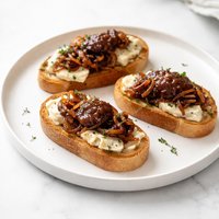 Crostini with Gorgonzola Caramelized Onions and Fig Jam