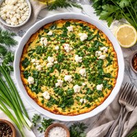 Crustless Quiche with Greens Herbs and Goat Cheese