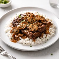 Cube Steak with Mushroom Gravy and Rice