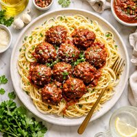 Easy Peasy Meatballs Over Buttered Noodles