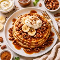 Fluffy Banana Pancakes with Caramel Pecan Sauce and Ricotta Cream