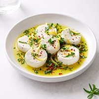 Goat Cheese Marinated with Lemon and Herbs