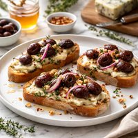 Gorgonzola and Kalamata Snack Toasts