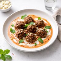 Greek Meatballs in Tomato Yogurt Mint Sauce