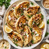 Grilled Cabbage Wedges with a Creamy Onion Vinaigrette
