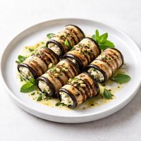 Grilled Eggplant Rolls with Mint and Garlic Dressing