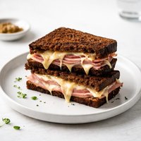 Grilled Gouda Cheese Sandwiches with Smoked Ham and Pumpernickel