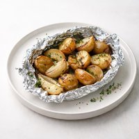 Grilled Potatoes and Onions with Herbs Foil Wrapped