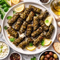 Grilled Stuffed Grape Leaves with Goat Cheese and Black Pepper