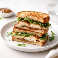 Grilled Turkey Brie and Apple Butter Sandwich with Arugula