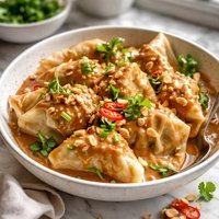 Hunan Dumplings with Peanut Butter Sauce