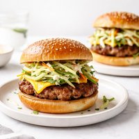 Jerk Pork Cheeseburgers with Green Apple Slaw