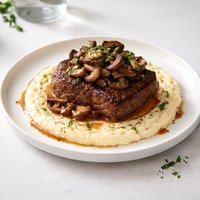 Mushroom Topped Steaks with Creamy Polenta