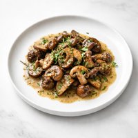 Mushrooms in Cognac Herb Sauce