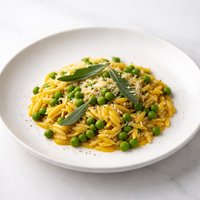 Orzo Pasta with Peas and Annatto Sage Sauce