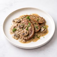 Ox Tongue with Mushroom Butter Sauce Lengua Con Champignon
