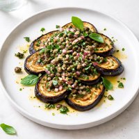 Pan Fried Eggplant with Onion Caper and Herb Sauce