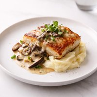 Pan Seared Mahi Mahi with Ginger Shiitake Cream Sauce on Potato