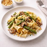 Paparadelle with Mushrooms Asparagus and Pignoli