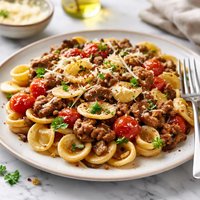 Pasta with Sausage Tomatoes and Mushrooms