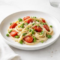 Pasta with Tomatoes Peas and Cream