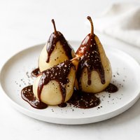 Pears with Chocolate Sauce and Cracked Black Pepper