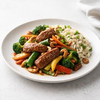 Pork and Vegetable Stir Fry with Cashew Rice
