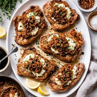 Pork Chops with Goat Cheese and Caramelized Onion