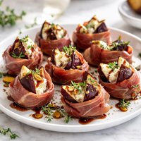 Prosciutto Wrapped Figs with Goat Cheese