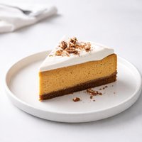 Pumpkin Cheesecake with Bourbon Sour Cream Topping