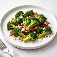 Quick Braised Broccoli with Sun Dried Tomatoes and Goat Cheese