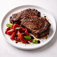 Rib Eye Steaks with Roasted Red Peppers and Balsamic Vinegar