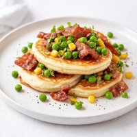 Ricotta Pancakes with Pancetta Peas and Corn