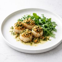 Scallops with Crumb Topping Herb Butter and Arugula