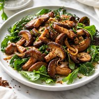Shiitake Mushrooms with Garlic and Shallots on Greens
