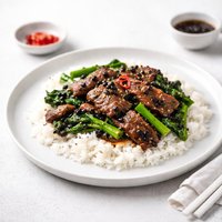 Sliced Beef with Black Beans Chinese Broccoli on Rice