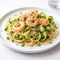 Spaghetti with Peas Zucchini Ribbons and Garlic Shrimp
