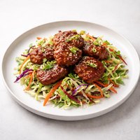 Spicy Korean Style Pork Medallions on Asian Cole Slaw