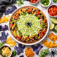 Spider Web Dip with Spooky Tortilla Chips Optional