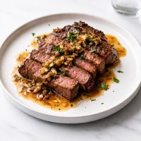 Steak in Garlic Wine Sauce