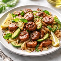 Sun Dried Tomato Sausage with Chayote Zucchini and Onions