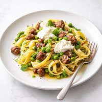 Tagliatelle with Smashed Peas Sausage and Ricotta Cheese Giada
