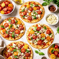 Thin Crisp Tortilla Pizzas with Tomatoes Goat Cheese